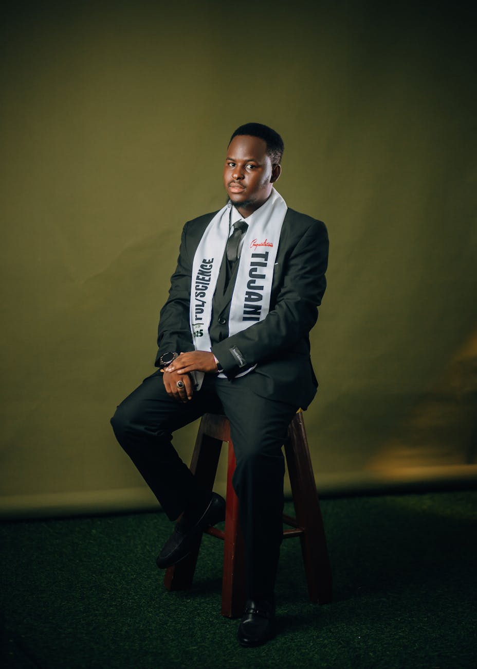 portrait of graduate in formal attire