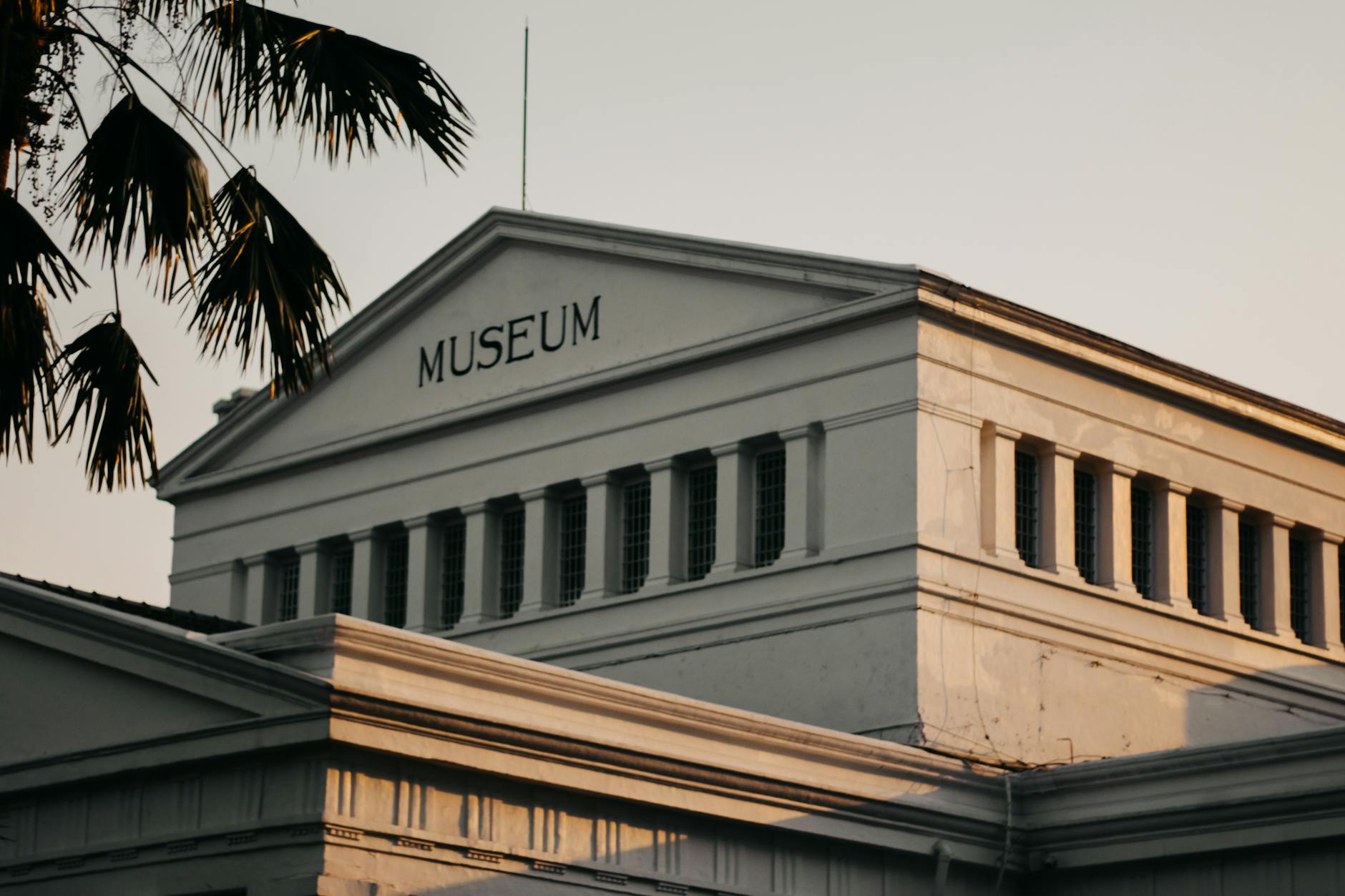 low angle photo of white museum during golden hour