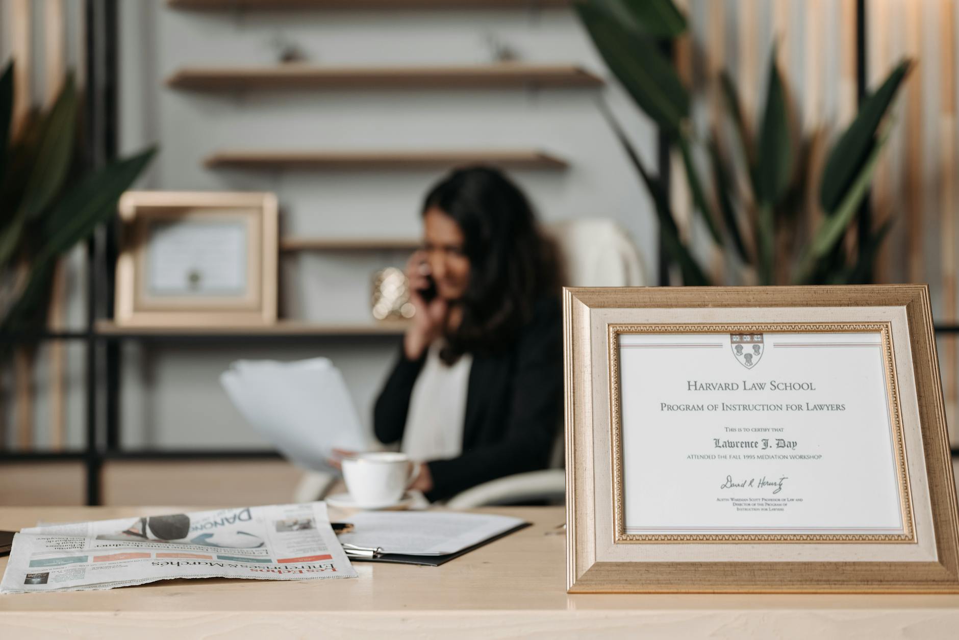 selective focus photo of a diploma on a frame