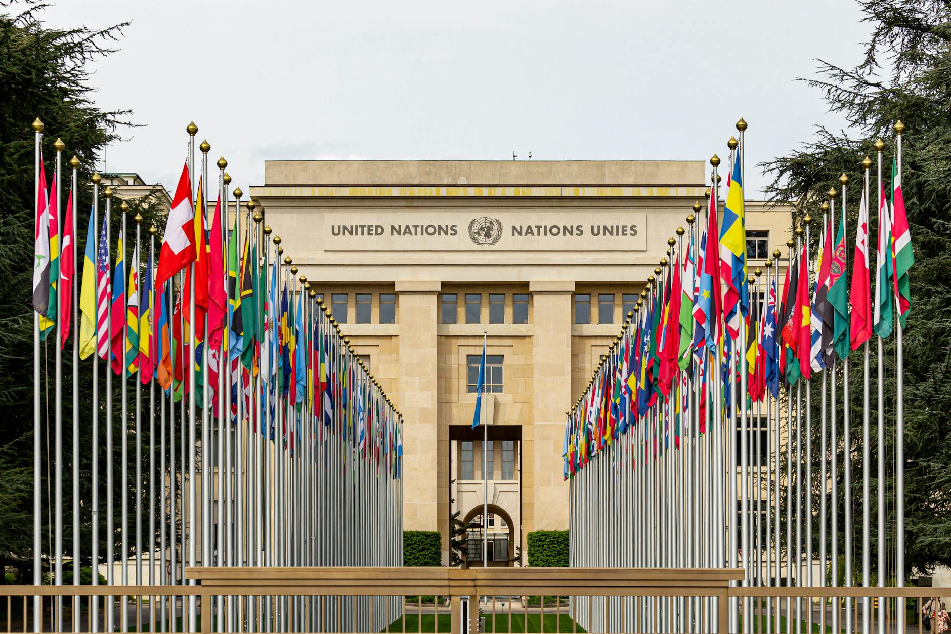 the allee des nations with the flags of member countries at united nations office geneva switzerland