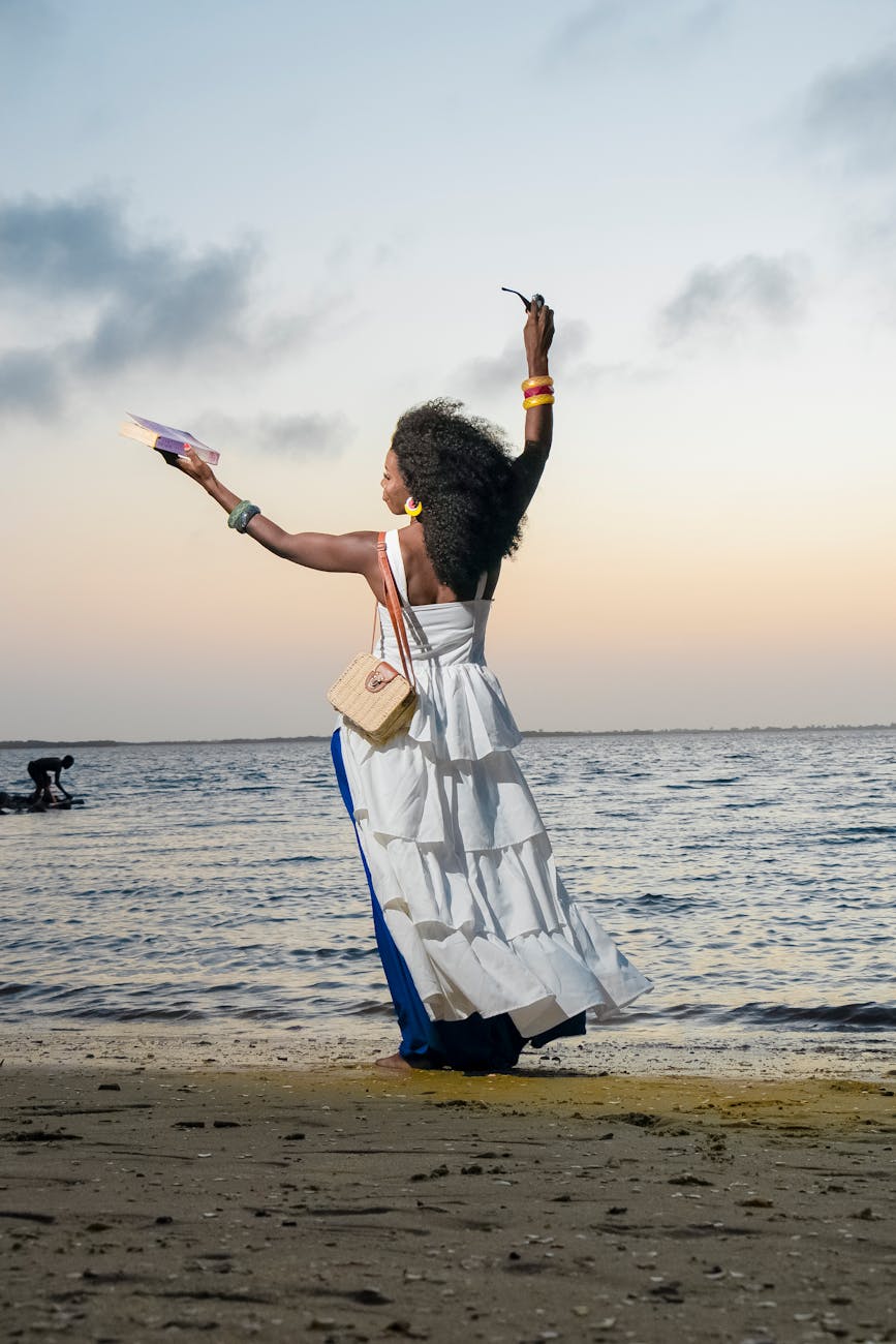 woman enjoying sunset on burkina faso beach