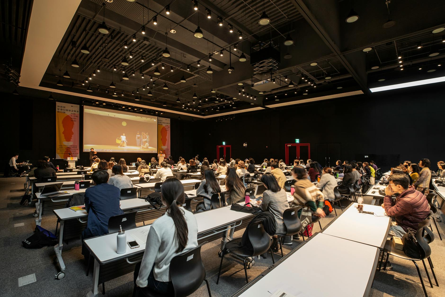 people sitting at a business conference