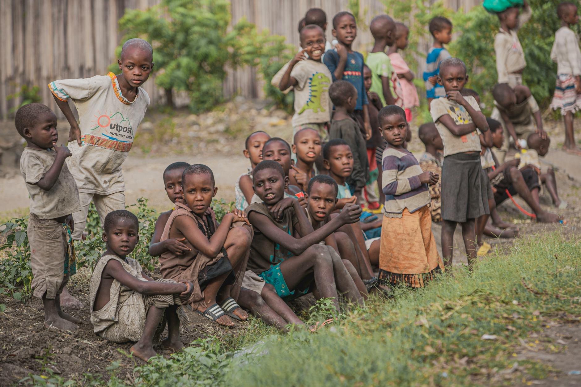 group of children sitting on the ground