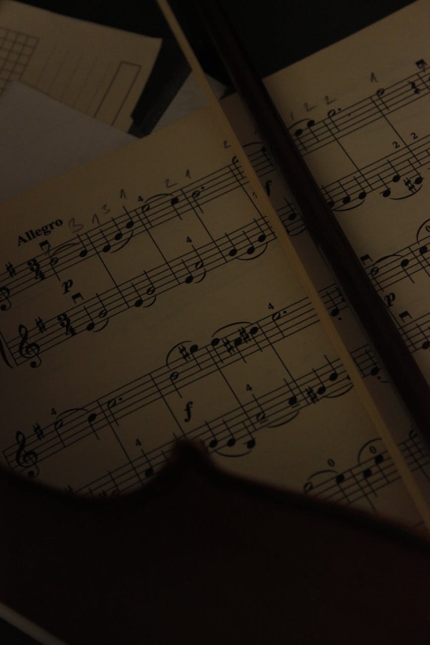 close up of a music sheet and a violin