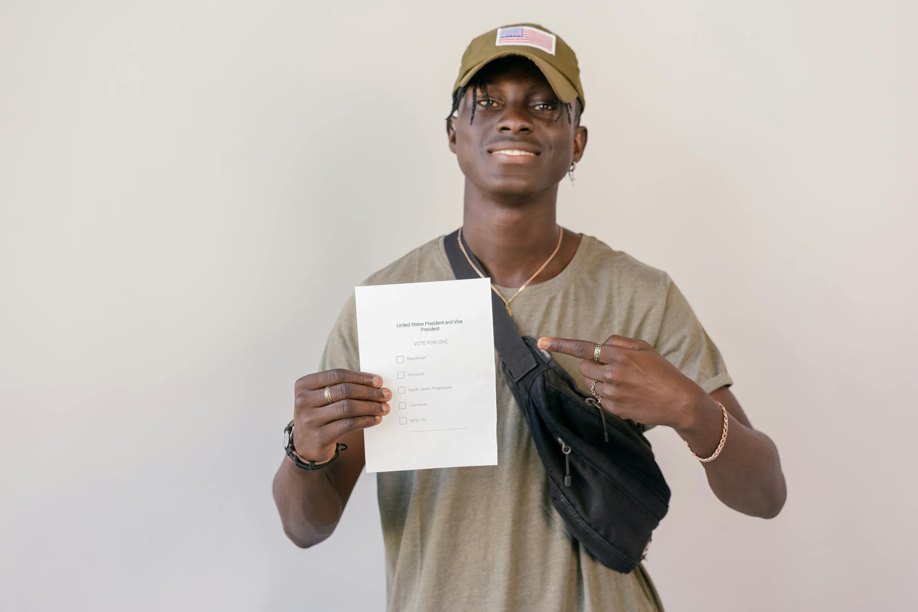 man pointing on paper