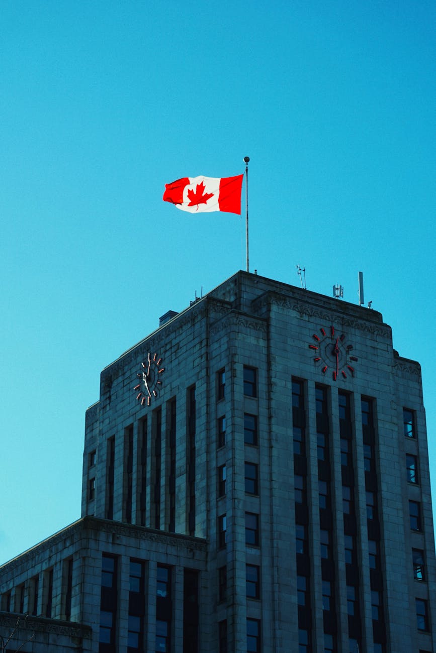 canadian flag atop vancouver city hall
