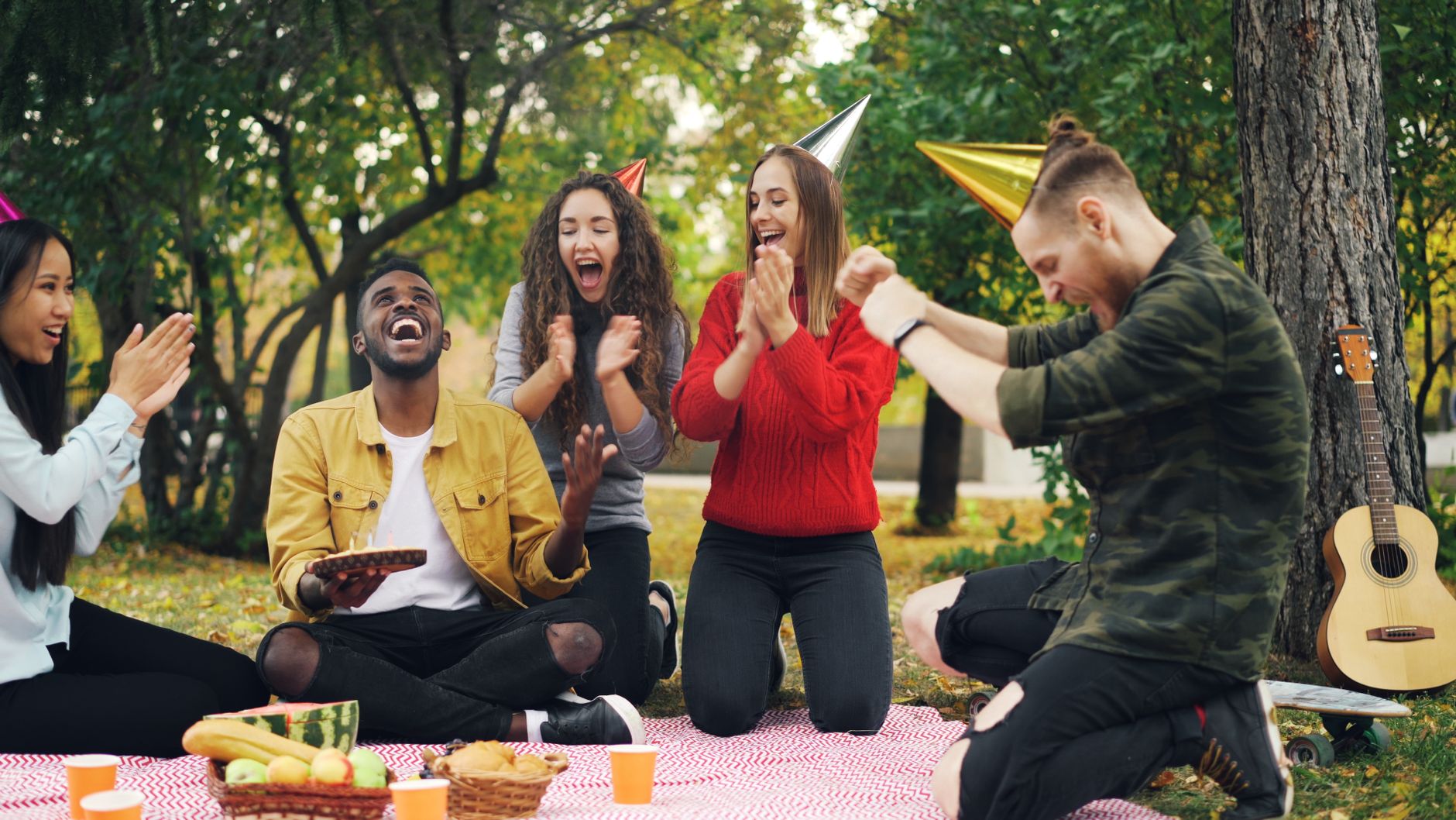 joyful outdoor birthday celebration with friends