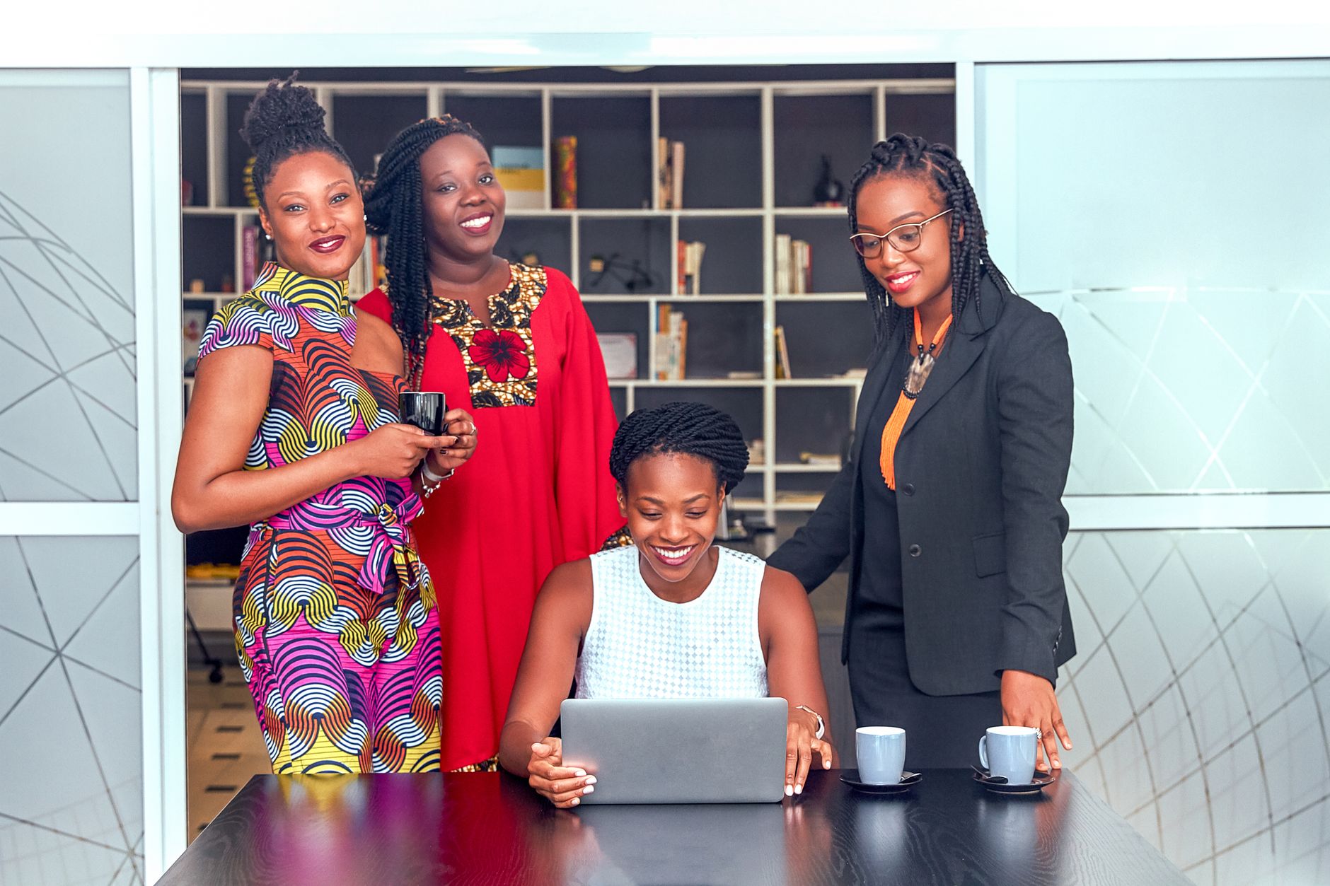 women smiling at the camera