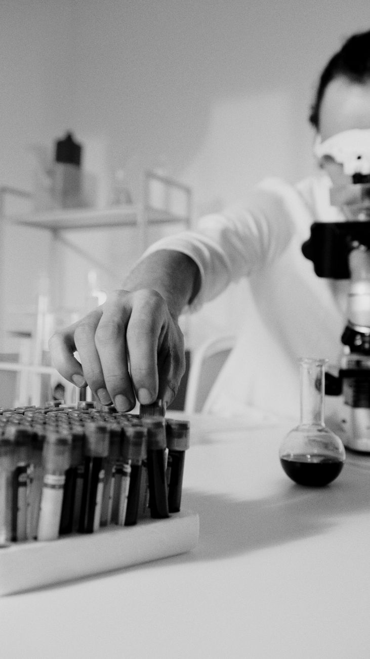 person getting a test tube