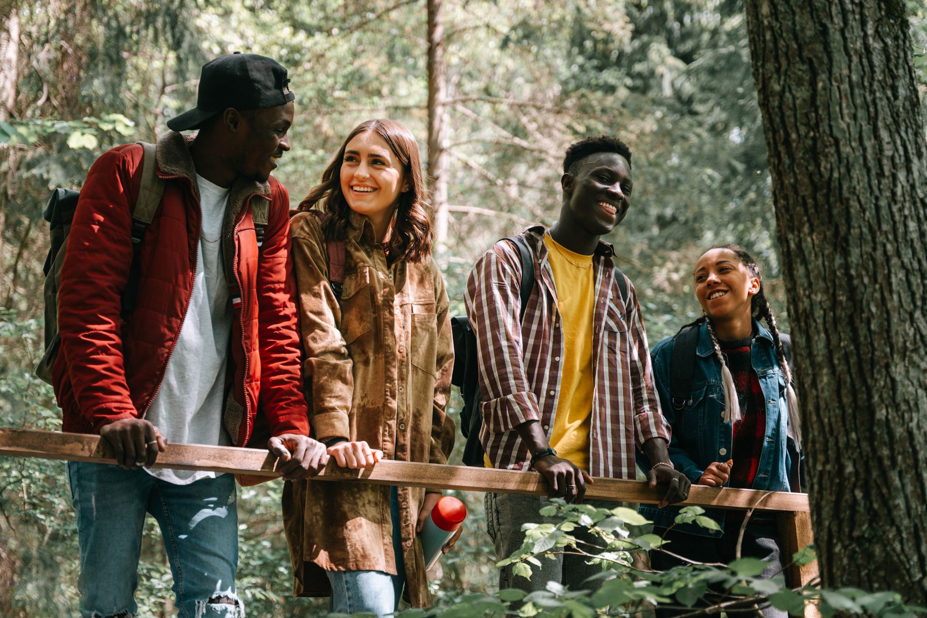 a group of friends out in the forest