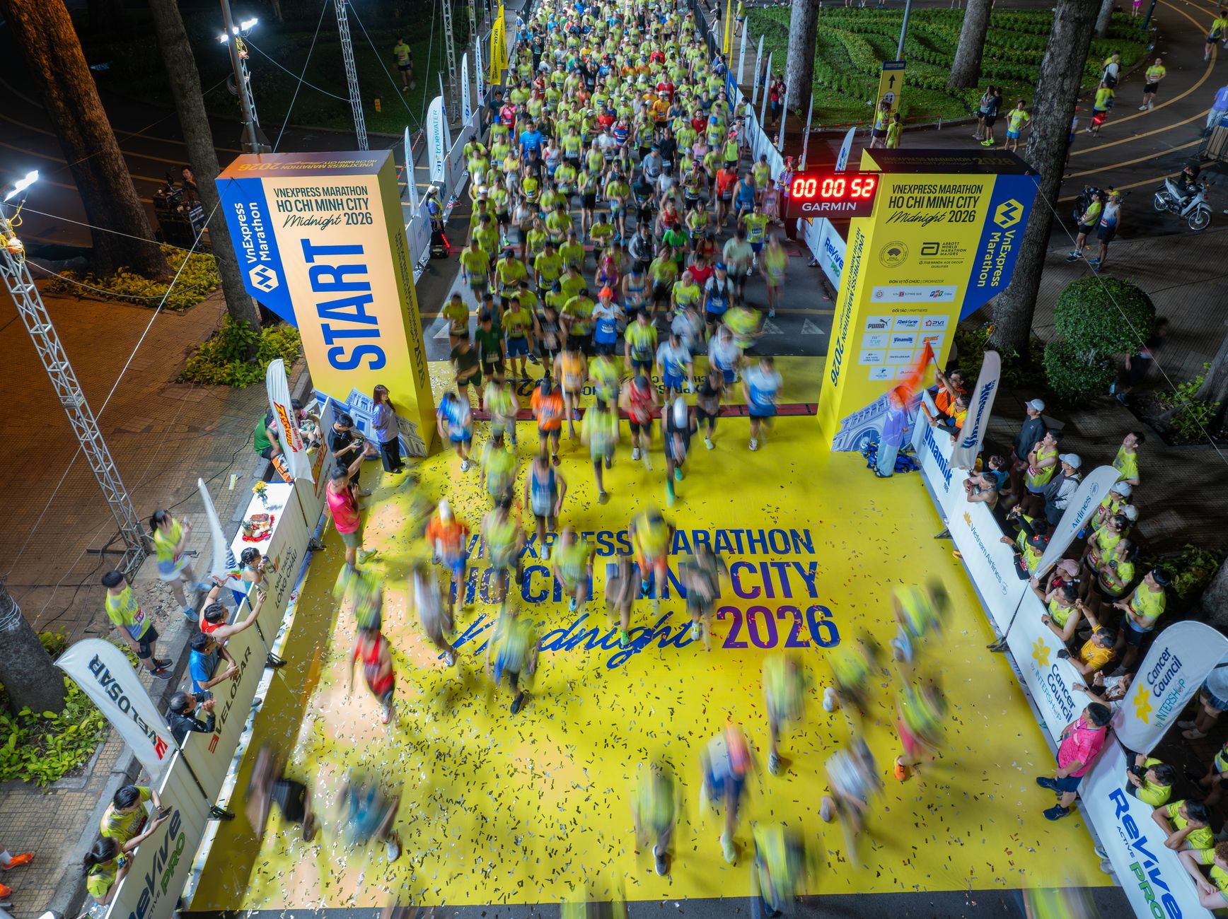 Energetic start of the 2026 Ho Chi Minh City Midnight Marathon, captured from above.