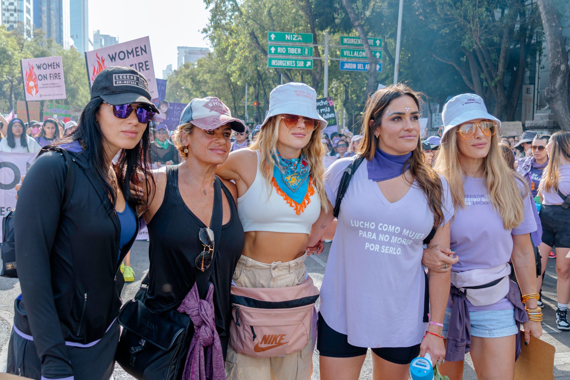 Women standing together during a powerful protest in Ciudad de México, championing women's rights.