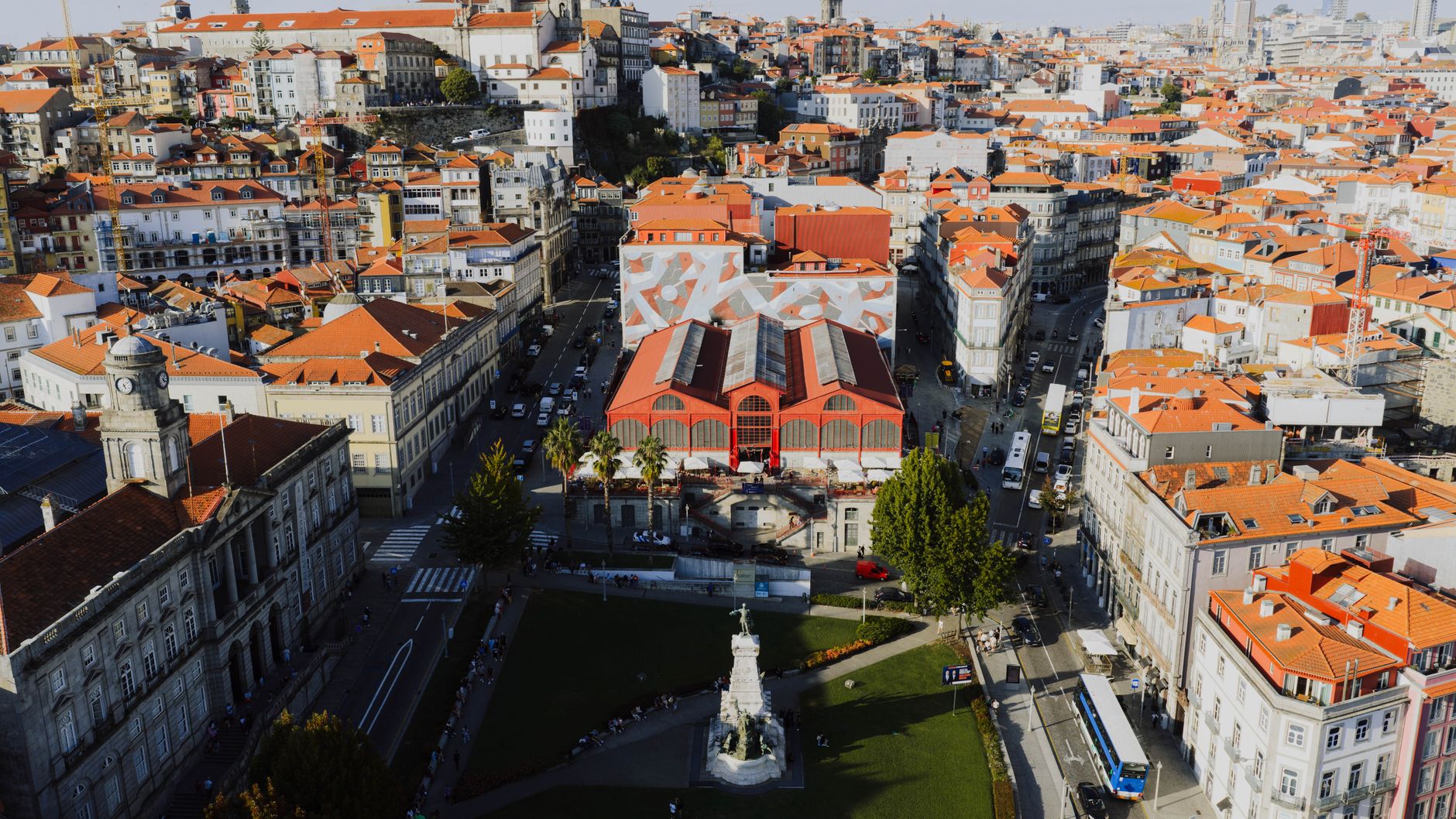 Aerial shot capturing Porto's iconic architecture and vibrant skyline at sunset, Portugal.