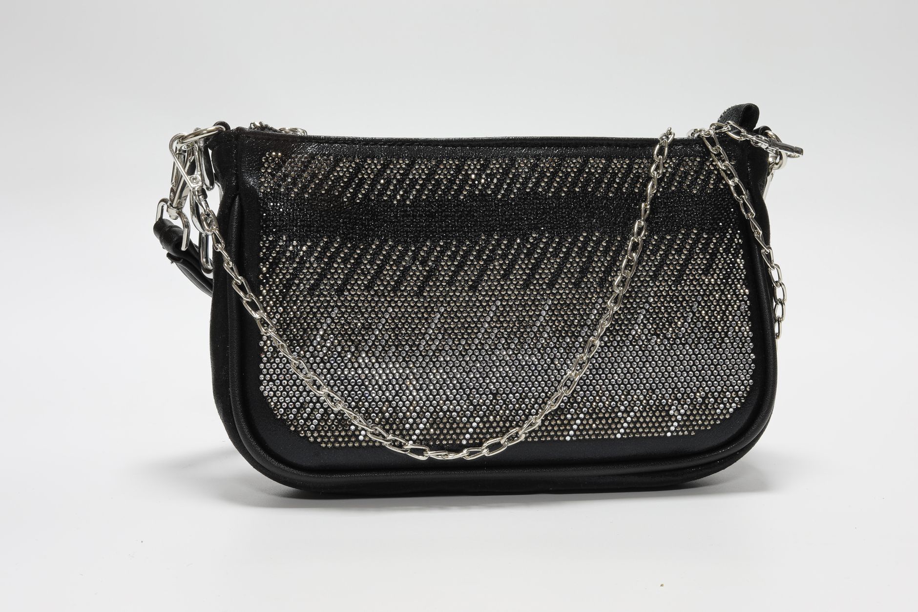 Stylish black handbag adorned with chain handle and rhinestones on a white background.